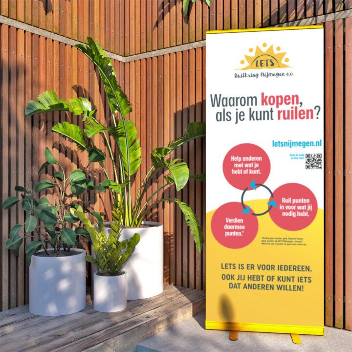 LETS roll up-banner met uitleg naast grote plant